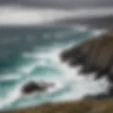 A panoramic view of Achill Island's rugged coastline with crashing waves