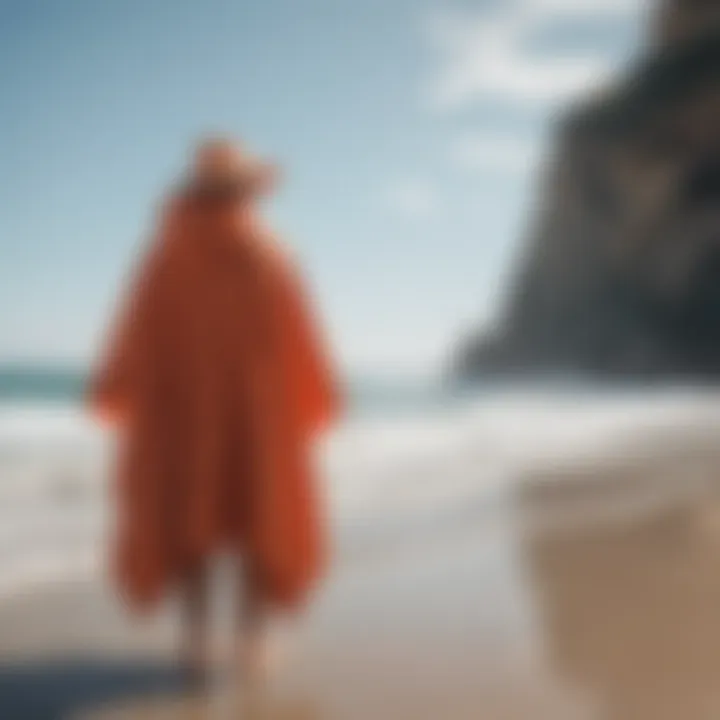 A beachgoer enjoying privacy while changing under a poncho.