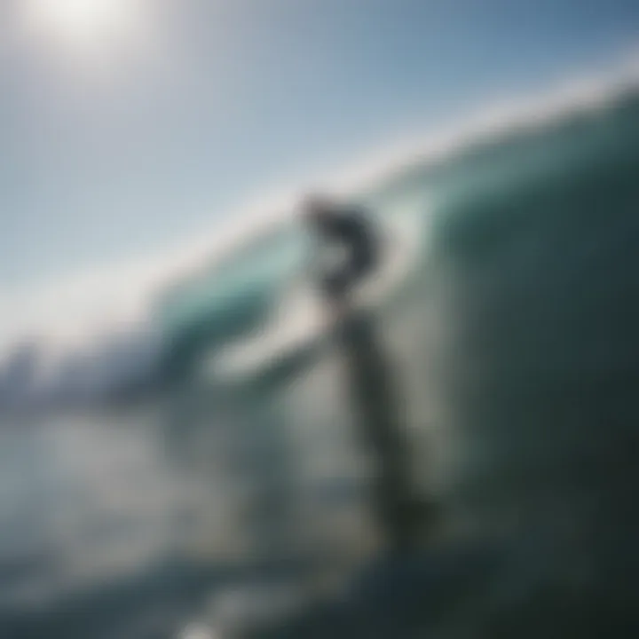 A surfer in action with a leash during a wave ride