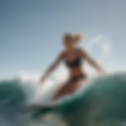 Dynamic showcase of the Billabong plunge top in action on the waves