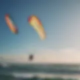 Detailed view of various kitesurfing kites on display, showcasing different shapes and sizes.