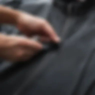 Close-up of a wetsuit zipper and seams being inspected