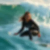 Dynamic surfing scene showcasing a Billabong top in action