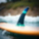 DHD fins showcased on a surfboard