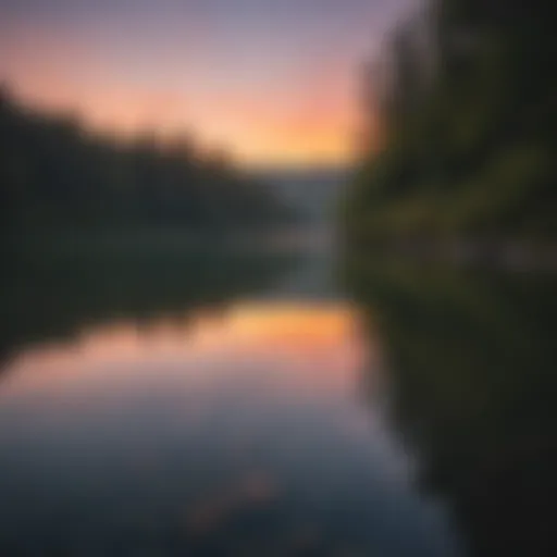 A serene lake at sunset reflecting rich colors