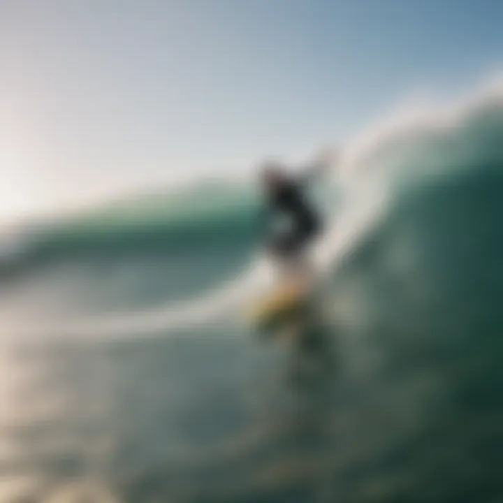 FCS fin attached to a surfboard in action on waves