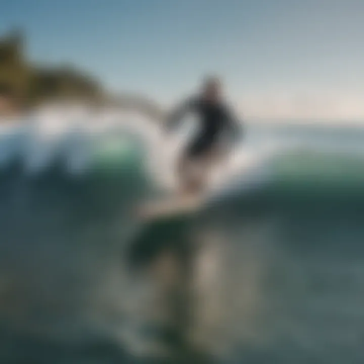 Surfer riding a wave on a fun board surfboard