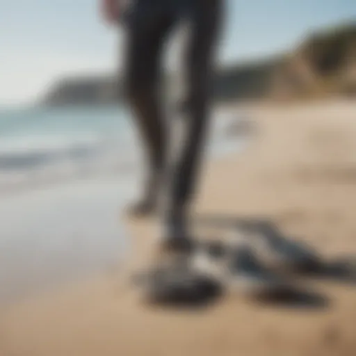 Stylish grey Sanuks on a sandy beach