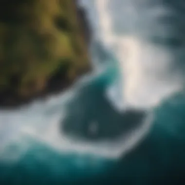 An aerial view of diverse surf breaks along the Kona coast, highlighting the variety of surfing conditions available.