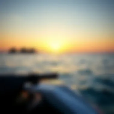 Serene sunset view over the ocean with water sports equipment