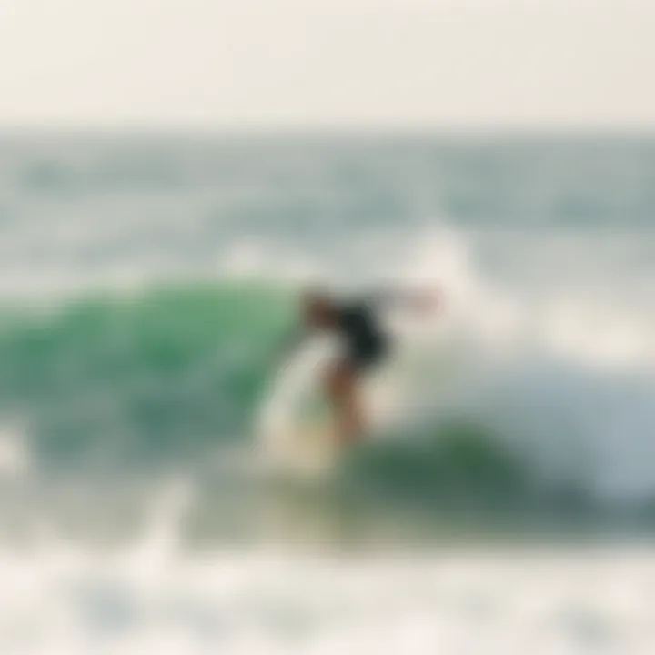 Surfer riding a wave at Nelscott Beach