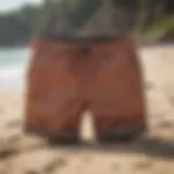 Stylish North Shore shorts displayed on a beach.