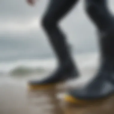 Rip Curl wetsuit boots in action during a surfing session.