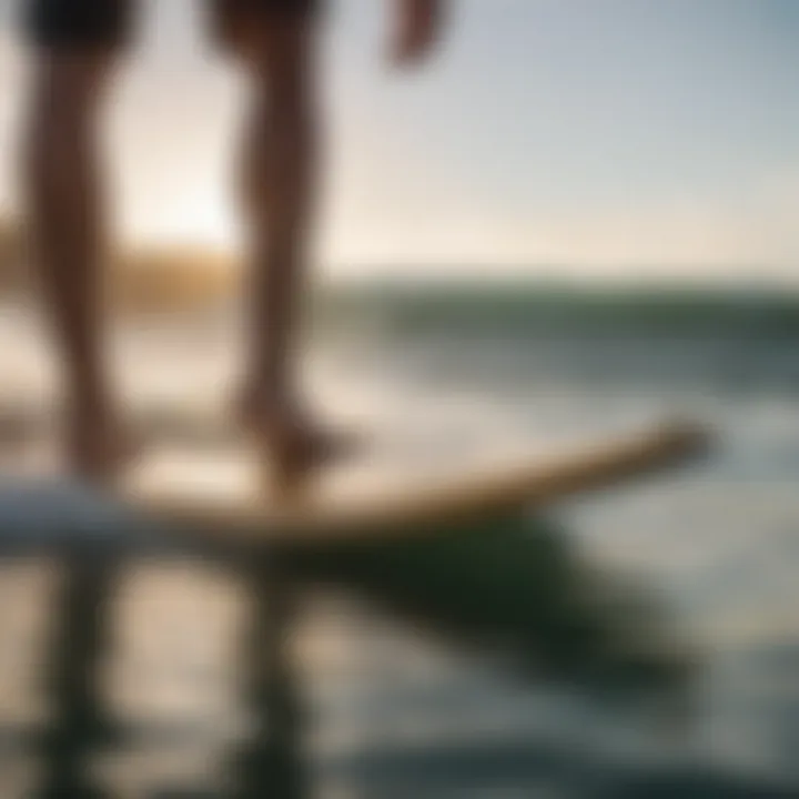 A close-up of a surfer's feet on a surfboard, ready to catch a wave