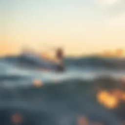A surfer riding a wave at sunset in Huntington Beach