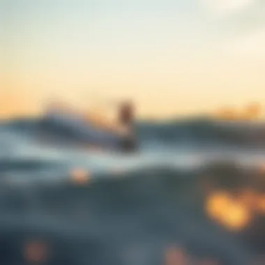 A surfer riding a wave at sunset in Huntington Beach