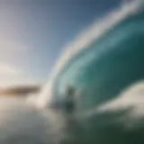 A serene beach landscape showcasing a surfer catching a wave