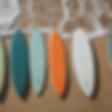 A variety of fiberglass skimboards arranged to highlight different shapes and sizes