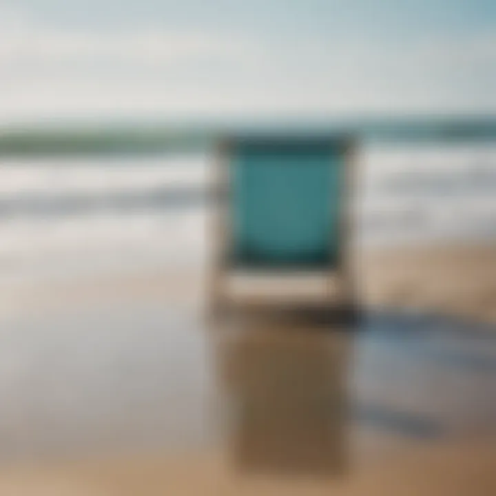 A solitary beach chair facing the ocean waves