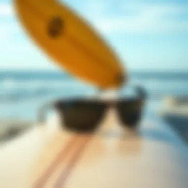 Otis Sunglasses on a Surfboard at the Beach A scenic beach setting with Otis sunglasses placed on a surfboard