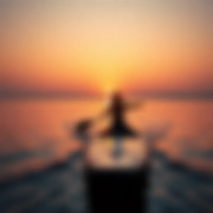 A paddleboarder navigating calm waters at sunset