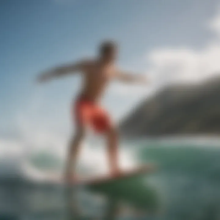 Athlete showcasing board shorts while surfing