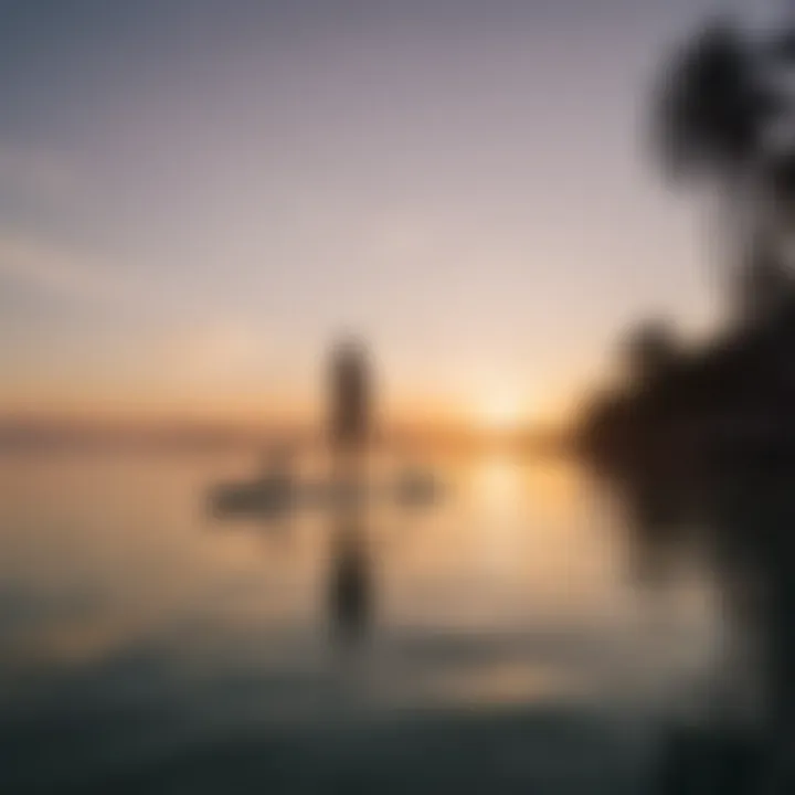 A serene paddleboarding scene at sunset with reflections on the water