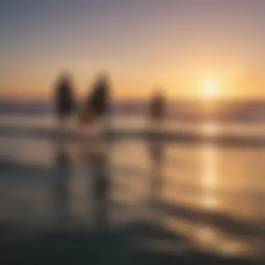 A vibrant sunset over the ocean showcasing surfers riding waves