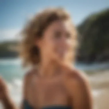 Individual applying Sun Bum Curls and Waves Shampoo after a surfing session.