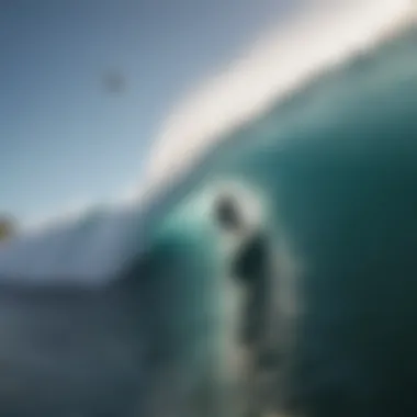 Surfer maneuvering on a wave with specific fin configuration