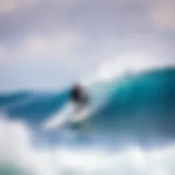 Surfer riding a wave in the Caribbean Sea