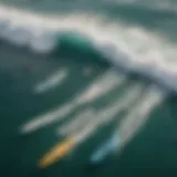 An aerial view of a surf competition showcasing surfboards and competitors in the ocean