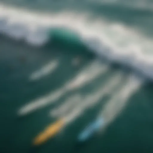 An aerial view of a surf competition showcasing surfboards and competitors in the ocean