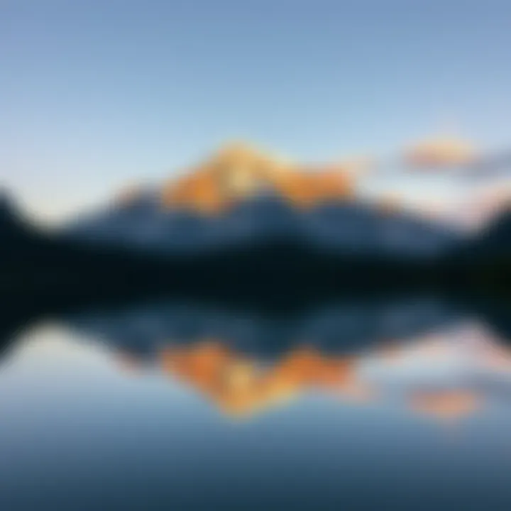 A breathtaking mountain vista reflecting in a crystal-clear lake, encapsulating the grandeur of the natural world.
