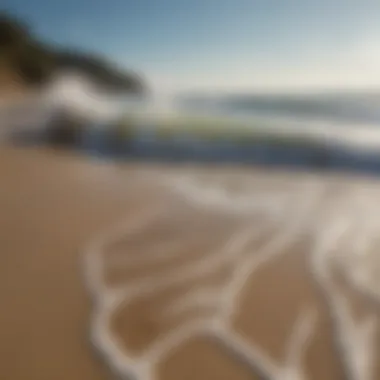 Tidal Movements on a Beach A serene beach with tidal patterns visible in the sand