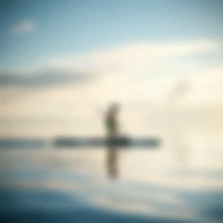 User navigating calm waters on the Tower Explorer Paddle Board