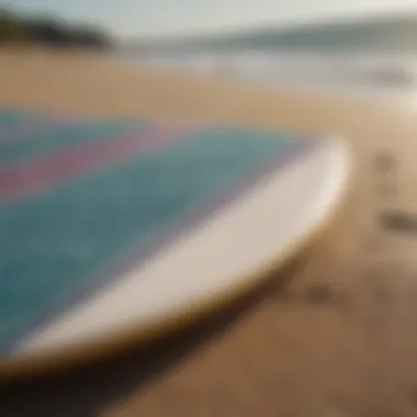 A well-maintained fiberglass skimboard resting on a beach towel with care tips nearby.