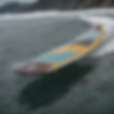 A close-up view of a hydrofoil surfboard showcasing its sleek design