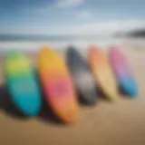 A vibrant selection of Victoria skimboards displayed on a sandy beach