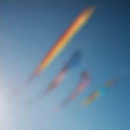 Colorful kites soaring in a clear blue sky